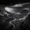 Silhouettes of the Canyon Poster featuring a dramatic canyon landscape in black and white