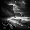 Epic Seascape Poster – black and white ocean scene with dramatic cliffs and waves.